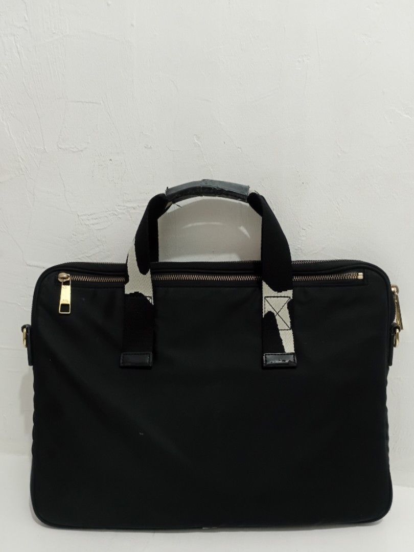 Marc Jacobs🖤laptop bag / Briefcase (Category: Luxury Bags & Wallets) located in Navotas City. Submitted by ms.soulana (Listing ID 1469205415, Image 2). Description: PreOwned Lightly Used Authentic Marc Jacobs commuter laptop bag in sleek black nylon - Safely fits up to 13-inch laptops and daily essentials - Elegant gold-tone hardware and sturdy dual top handles - Secure top zip closure to keep your belongings safe - Impeccable interior lining wi