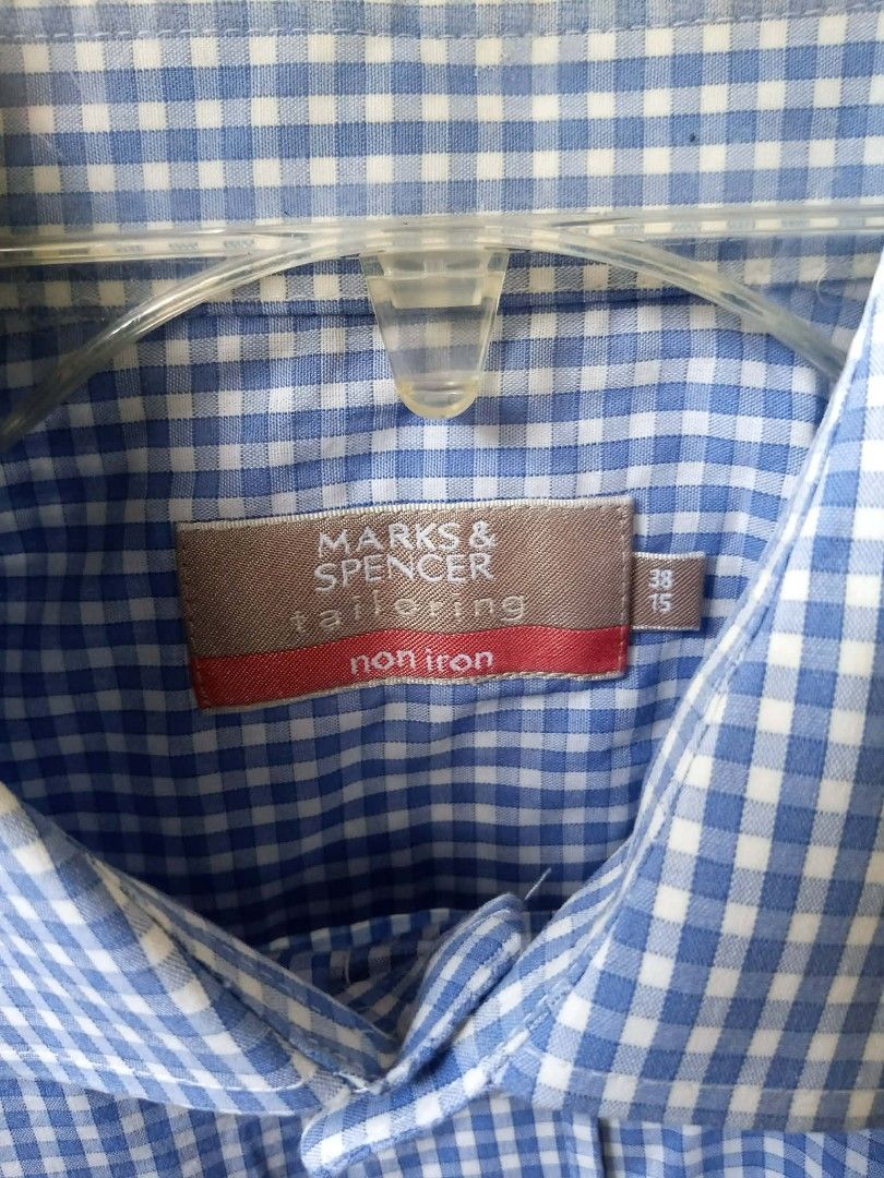 MARKS SPENCER Blue Gingham Checkered Short Sleeve Shirt (Category: Formal Shirts) located in Pasig City. Submitted by rjkfindsofficial (Listing ID 1469175766, Image 2). Description: ITEM DETAILS & SPECS: • Brand: MARKS & SPENCER (Tailoring Line) • Pattern / Color: Gingham Checkered / Blue Mix & White • Feature: Non-Iron / Wrinkle-Resistant Fabric • Material: 55% Cotton, 45% Polyester • Tag Size: Collar 38cm / 15in (Fits Men's Small to Slim Medium