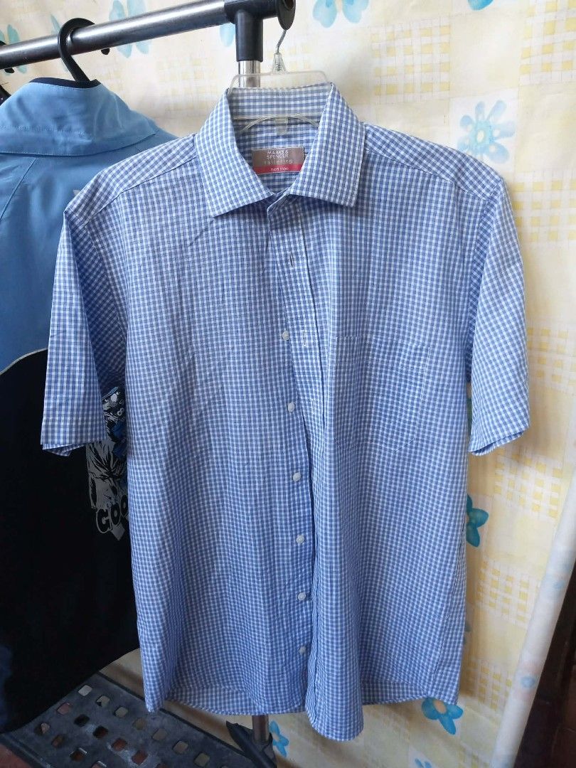 MARKS SPENCER Blue Gingham Checkered Short Sleeve Shirt (Category: Formal Shirts) located in Pasig City. Submitted by rjkfindsofficial (Listing ID 1469175766, Image 1). Description: ITEM DETAILS & SPECS: • Brand: MARKS & SPENCER (Tailoring Line) • Pattern / Color: Gingham Checkered / Blue Mix & White • Feature: Non-Iron / Wrinkle-Resistant Fabric • Material: 55% Cotton, 45% Polyester • Tag Size: Collar 38cm / 15in (Fits Men's Small to Slim Medium
