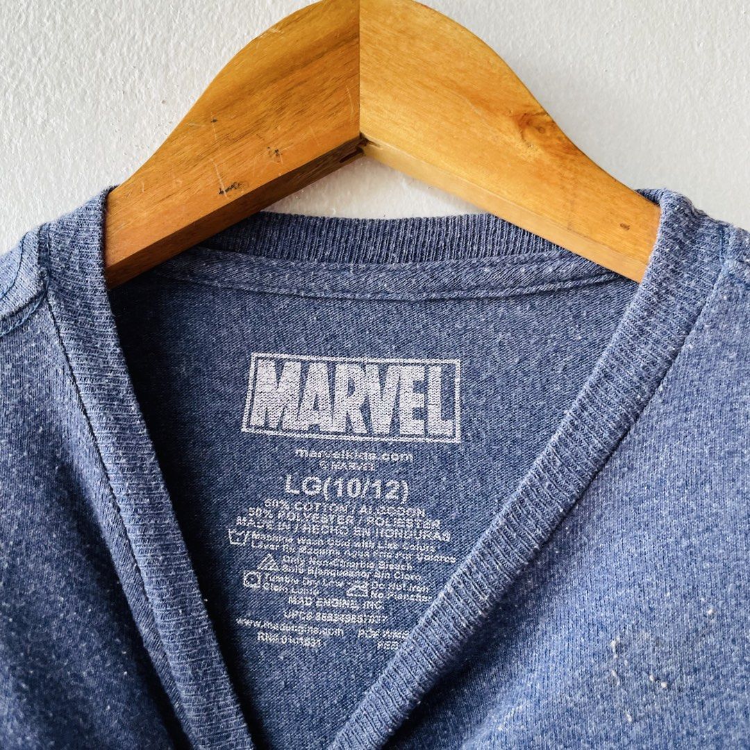 Marvel Spider-Man Comic Print T-Shir (Category: Babies & Kids Fashion) located in Caloocan City. Submitted by lovemyclothes21 (Listing ID 1469263308, Image 3). Description: - Design: Marvel Spider-Man comic book panel graphic print - Color: Heather blue - Size: LG (Fits 10-12 years old) - Material: Comfortable cotton and polyester blend - Style: Crew neck, short sleeves - Origin: Made in Honduras - Condition: Brand new / Excellent quality.