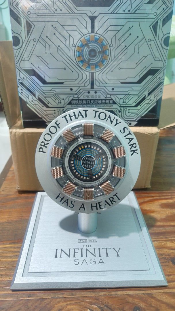 Marvel The Infinity Saga Iron Man Arc Reactor Wireless Charger (Category: Chargers & Cables) located in Las Pinas. Submitted by edsniw (Listing ID 1469248323, Image 3). Description: - For Sale - Iron man Arc reactor wireless charger and decor - Authentic Killerbody Iron Man Arc Reactor wireless charger (KB20104) - Premium CNC aluminum alloy construction with iconic 'Proof That Tony Stark Has A Heart' engraving - Fast wireless charging support up 