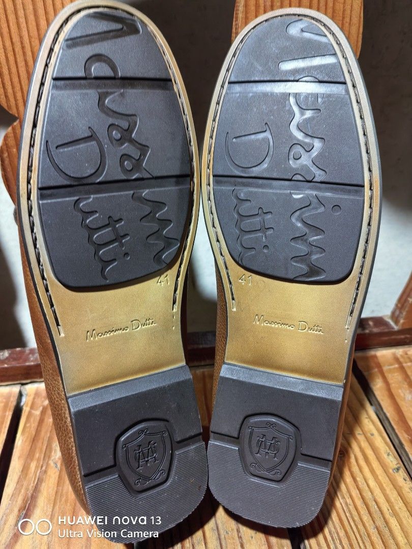 Massimo Dutti Brown Leather Loafers Size 41 (Category: Dress Shoes) located in Cebu City. Submitted by abellarces30419 (Listing ID 1469201354, Image 3). Description: - Brand: Massimo Dutti Brown pebbled leather Original - Style: Leather slip-on loafers - Color: Tan brown - Size: EU 41 - Details: Decorative front tie laces and stylish contrast stitching - Soles: Stamped brand logo with good traction - Condition: Clean inside and out, ready to wear