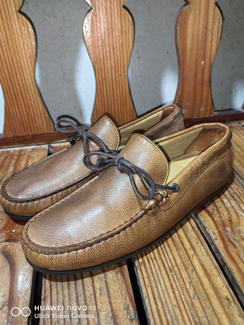 Massimo Dutti Brown Leather Loafers Size 41 (Category: Dress Shoes) located in Cebu City. Submitted by abellarces30419 (Listing ID 1469201354, Image 1). Description: - Brand: Massimo Dutti Brown pebbled leather Original - Style: Leather slip-on loafers - Color: Tan brown - Size: EU 41 - Details: Decorative front tie laces and stylish contrast stitching - Soles: Stamped brand logo with good traction - Condition: Clean inside and out, ready to wear