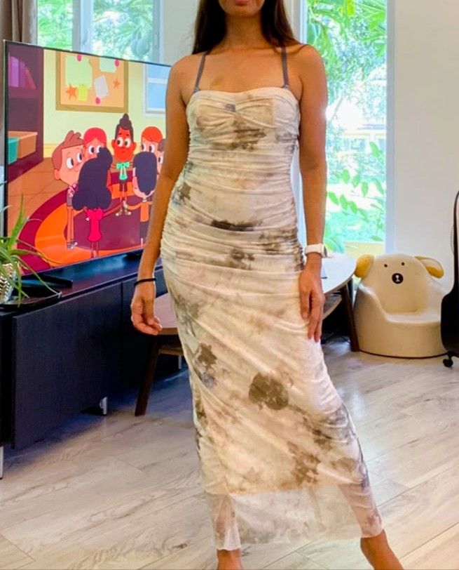 Maxi dress ruched bodycon (Category: Dresses) located in Makati City. Submitted by larasdowry (Listing ID 1469263311, Image 3). Description: Tie-dye mesh maxi dress with a flattering ruched bodycon fit, straight neckline, and back slit. Features thin cross-straps and a comfortable inner lining. Perfect for casual days or night outs! good as new. never used..