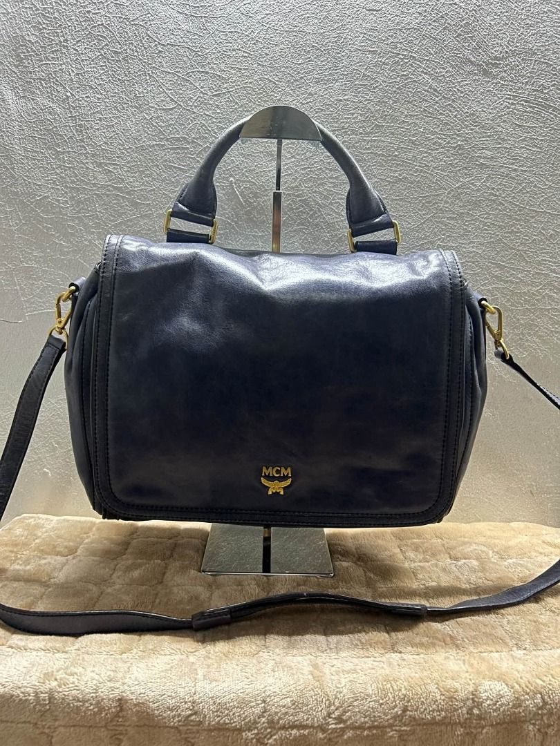 MCM BLUE DISTRESS LEATHER HAND BAG WITH SLING (Category: Cross-body Bags) located in Caloocan City. Submitted by j3ngsanity (Listing ID 1469301270, Image 1). Description: ISSUE : MIN SIGN OF USAGE ONLY YKK ZIP / CODED.