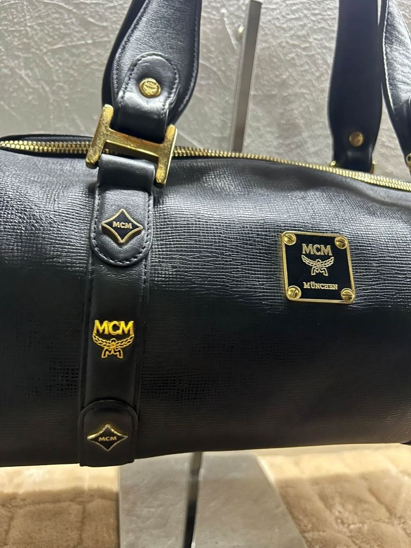 MCM DUFFLE BAG (Category: Shoulder Bags) located in Caloocan City. Submitted by j3ngsanity (Listing ID 1469291497, Image 2). Description: ISSUE : NEED CLEANING / MIN DOT STAIN / MIN LEATHER SCRATCH CODED.