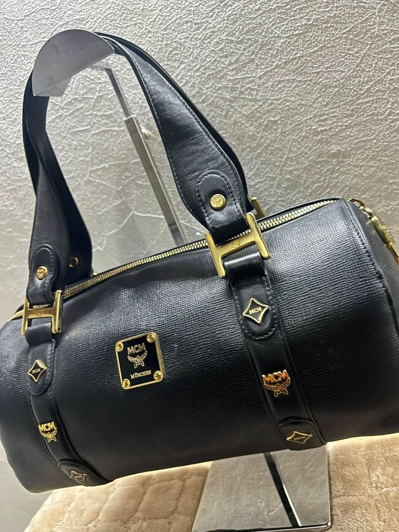 MCM DUFFLE BAG (Category: Shoulder Bags) located in Caloocan City. Submitted by j3ngsanity (Listing ID 1469291497, Image 3). Description: ISSUE : NEED CLEANING / MIN DOT STAIN / MIN LEATHER SCRATCH CODED.