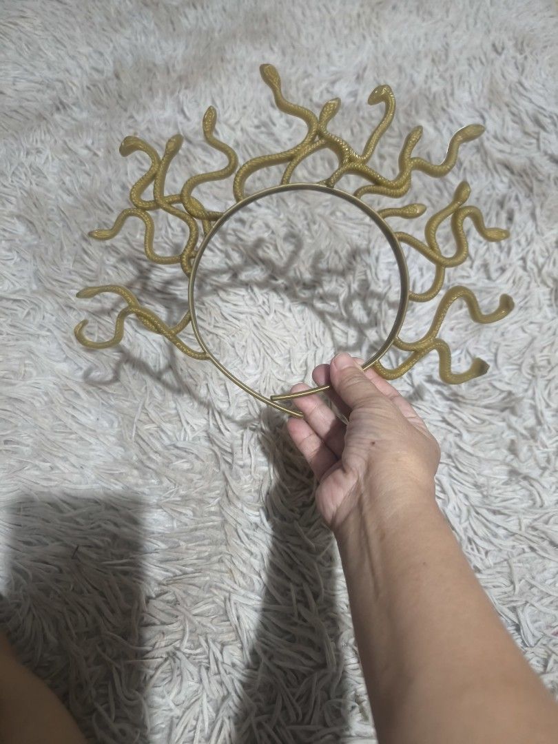 Medusa Headband Halloween Accessory (Category: Hair Accessories) located in Marikina City. Submitted by alecfordy (Listing ID 1469202055, Image 2). Description: Medusa snake headband designed as a costume accessory for Halloween, cosplay, or Greek mythology-themed parties. color : black and gold.