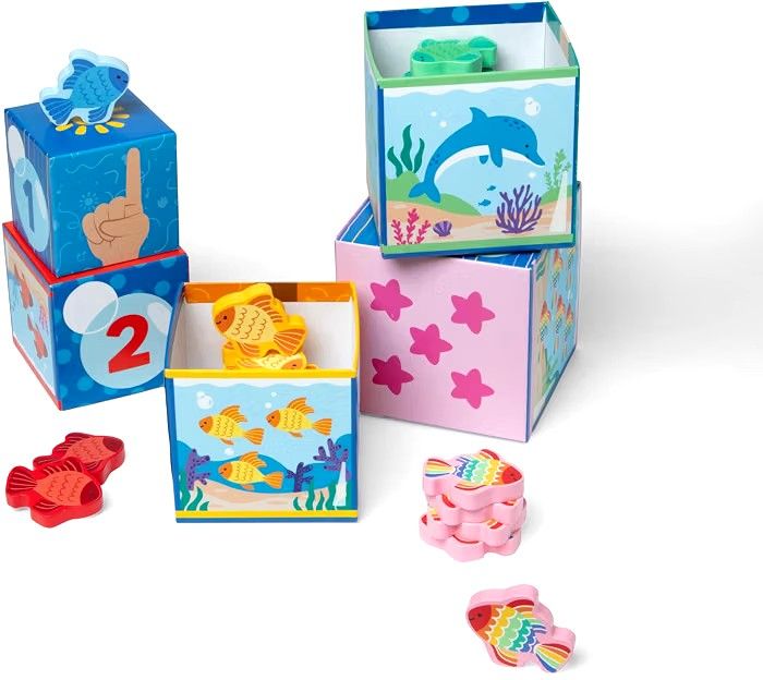 Melissa & Doug Ms. Rachel Surprise Learning Nesting Blocks (Category: Educational & Learning Toys) located in Calasiao. Submitted by klowdeen (Listing ID 1469218606, Image 3). Description: SHIPPED FROM THE USA - Authentic Melissa & Doug x Ms. Rachel educational toy set - Includes stackable boxes featuring numbers, sign language hand gestures, and vibrant ocean artwork - Comes with colorful wooden fish toys for counting and sorting activities - Ex