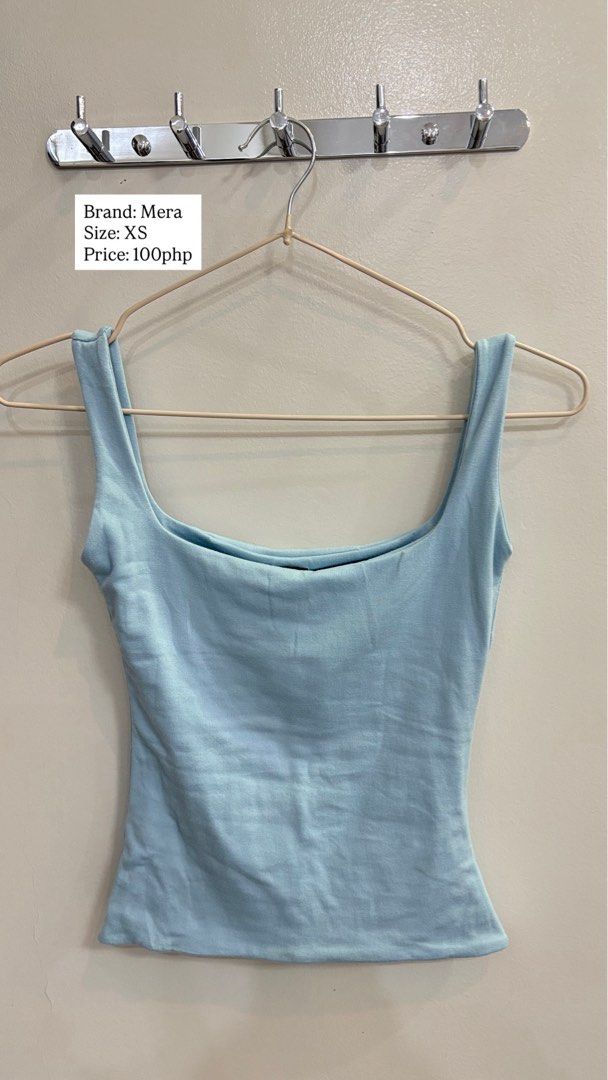 Mera Blue Square Neck Tank Top Size XS (Category: Sleeveless) located in Cebu City. Submitted by chinaleah (Listing ID 1469290920, Image 1). Description: - Brand: Mera - Color: Light Blue - Size: XS - Design: Square neckline with thick shoulder straps - Fit: Cropped - Style: Basic casual piece, easy to match with high-waist jeans or shorts.