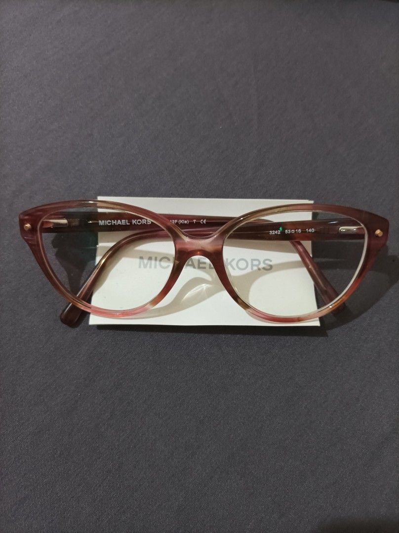 Michael Kors Cat-eye Eyeglasses with Case (Category: Sunglasses & Eyewear) located in Quezon City. Submitted by 90sradar (Listing ID 1469243359, Image 3). Description: Michael Kors Cat-eyes with case 2000 - Tortoise Shell, never used complete with pamphlet and branded microfiber cloth 1500 - Black, lightly used Both cases have signs of ware. .
