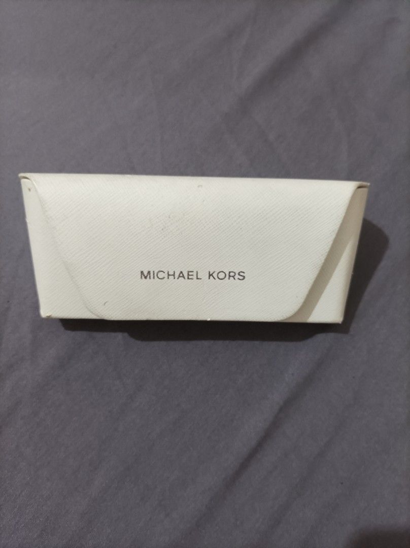 Michael Kors Cat-eye Eyeglasses with Case (Category: Sunglasses & Eyewear) located in Quezon City. Submitted by 90sradar (Listing ID 1469243359, Image 2). Description: Michael Kors Cat-eyes with case 2000 - Tortoise Shell, never used complete with pamphlet and branded microfiber cloth 1500 - Black, lightly used Both cases have signs of ware. .