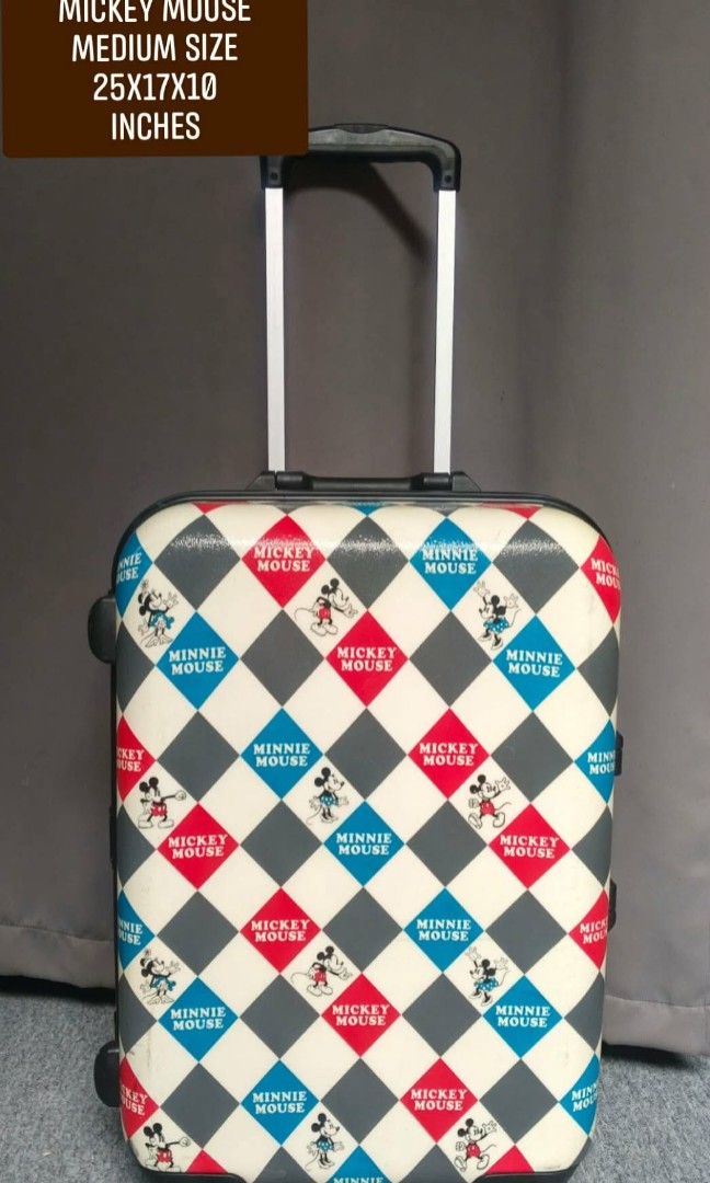 Mickey by Disney (Category: Luggage) located in Manila. Submitted by jzjapansurplus (Listing ID 1469208025, Image 1). Description: IMPORTED FROM JAPAN MICKEY MOUSE BY DISNEY MEDIUM SIZE 🔰 SECURITY KEY LOCK TSA APPROVED 🔰SMOOTH 360 DUAL ROTATION WHEELS 🔰TELESCOPIC PUSH HANDLE 🔰TOP AND SIDE HANDLE CARRIER 🔰WIDER SPACE SUITCASE WITH SUPPORT STRAP AND DIVIDER NO ISSUE‼️GOOD CONDITION MINIMAL MARK OF USAGE ONLY.