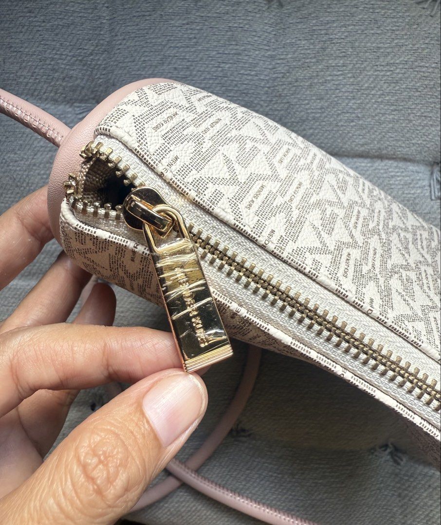 Miender Kurs Monogram Crossbody Bag Pink (Category: Cross-body Bags) located in Cebu City. Submitted by decluttereverythingcebu (Listing ID 1469179924, Image 2). Description: USED ONCE BY MY DAUGHTER (She doesnt like it) Brand: MIENDER KUR - Pink and white monogram crossbody bag - Secure top zip closure with chic gold-tone hardware - Brown fabric-lined interior featuring one zipper pocket and one open pocket - Super clean inside and out, practica