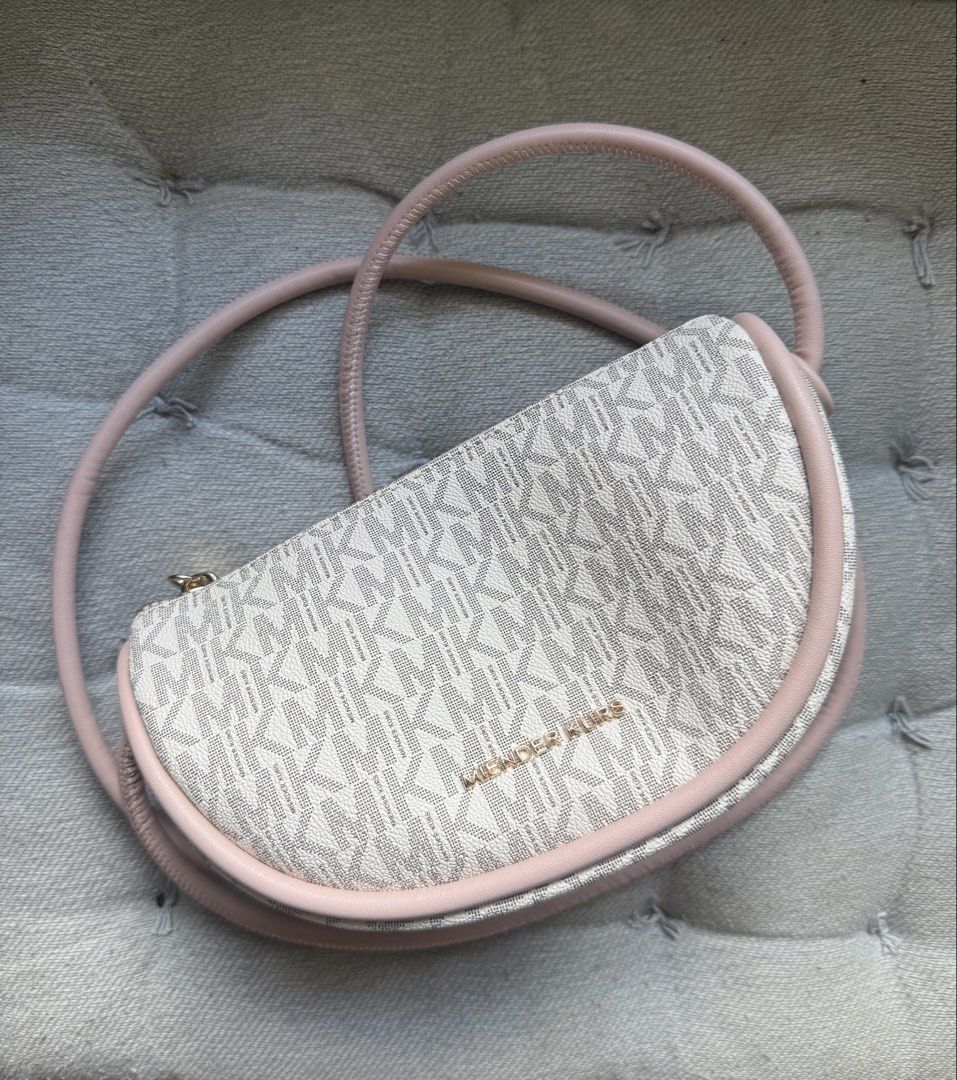Miender Kurs Monogram Crossbody Bag Pink (Category: Cross-body Bags) located in Cebu City. Submitted by decluttereverythingcebu (Listing ID 1469179924, Image 1). Description: USED ONCE BY MY DAUGHTER (She doesnt like it) Brand: MIENDER KUR - Pink and white monogram crossbody bag - Secure top zip closure with chic gold-tone hardware - Brown fabric-lined interior featuring one zipper pocket and one open pocket - Super clean inside and out, practica
