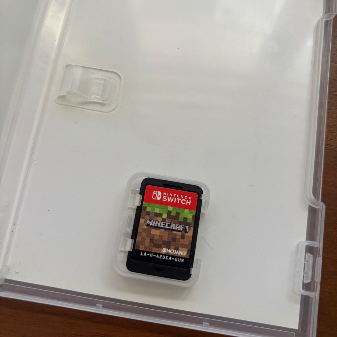 Minecraft Nintendo Switch Game Cartridge with Case (Category: Nintendo) located in Manila. Submitted by erin_closet (Listing ID 1469175093, Image 2). Description: - Game: Minecraft for Nintendo Switch (Physical Cartridge) - Region: EUR (PEGI 7 rated) - Condition: Tested and working perfectly.