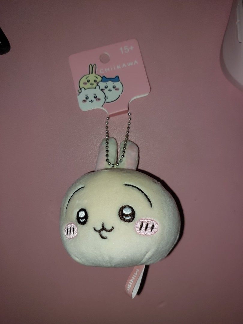 Miniso Chiikawa Usagi Plush Keychain Bag Charm (Category: Plushies & Soft Toys) located in Paranaque City. Submitted by krmru (Listing ID 1469190279, Image 1). Description: - Authentic Miniso x Chiikawa merchandise - Character: Usagi - Soft round plush head with detailed embroidery and pink cheeks - Features a secure metal ball chain and top mini loop tag - Brand new with original pink tag attached - Perfect for bags, keys, or as a gift GCash pay