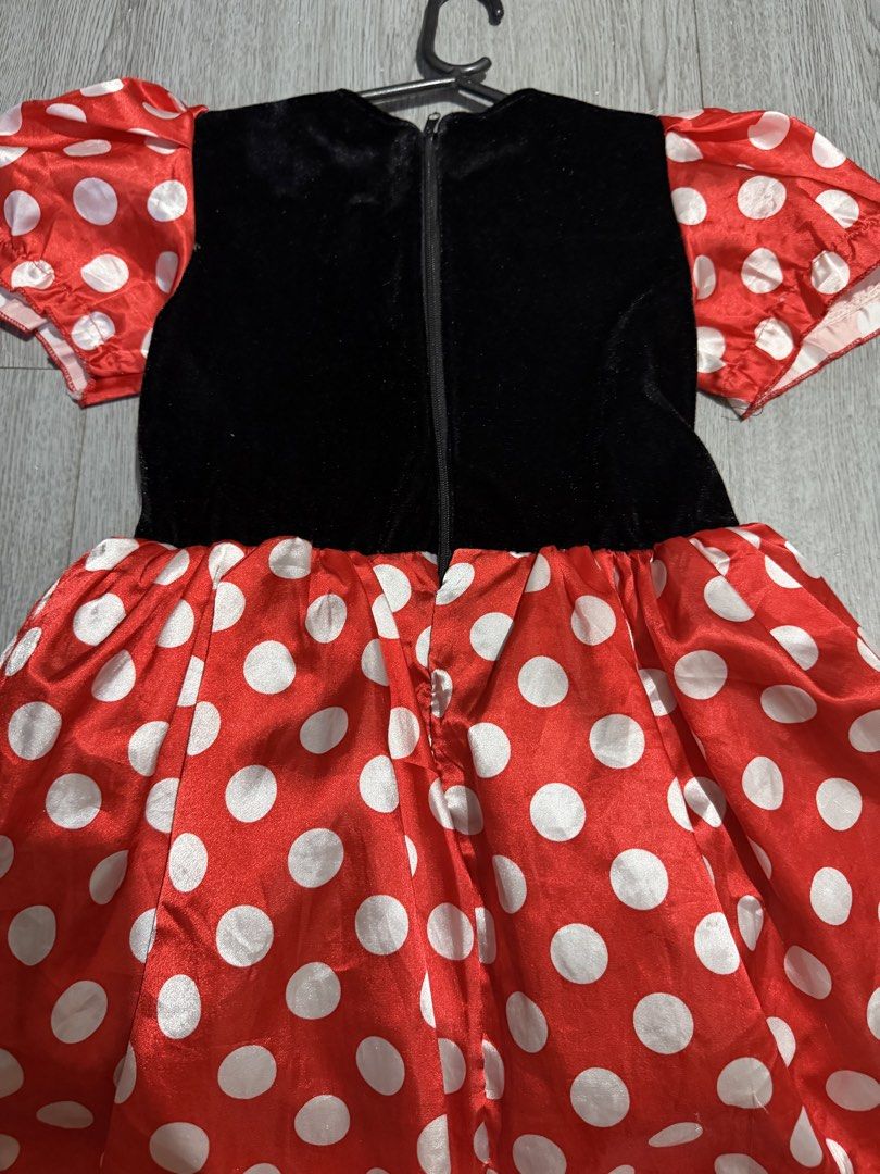 Minnie Mouse Dress/Costume (Category: Babies & Kids Fashion) located in Mabalacat. Submitted by mommypotassium (Listing ID 1469309977, Image 3). Description: - Red and white polka dot skirt with black velvet bodice - Sparkling red sequin bow and white collar/waist sash - Fluffy black tulle petticoat underneath for extra volume - Back zipper closure for easy dressing - Condition: Worn once for a birthday party.
