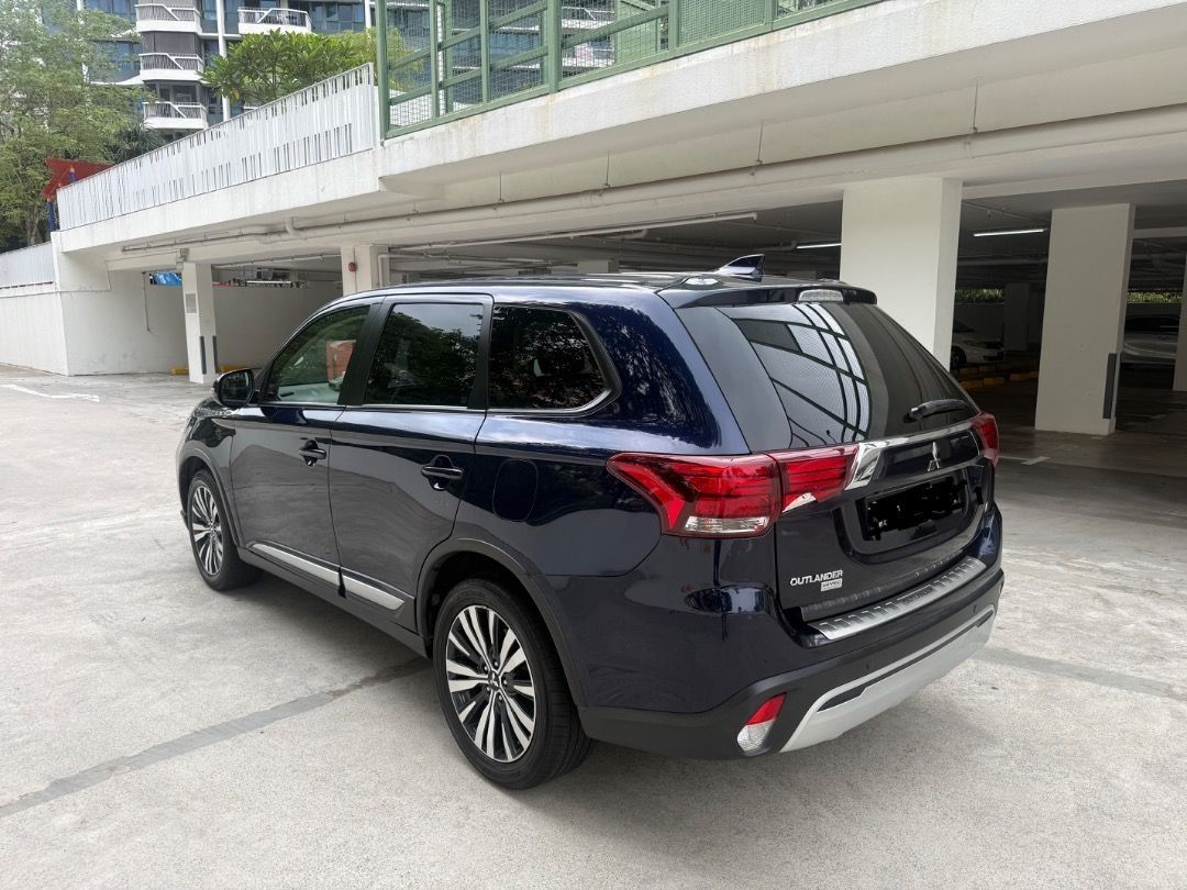 Mitsubishi Outlander 2.0 CVT Classic 7-Seater (A) (Category: Used Cars) located in Singapore. Submitted by goldenbear_72 (Listing ID 1469205755, Image 2). Description: Ad details on SGCarMart - ✨ Vehicle Details Model: Mitsubishi Outlander 2.0 Mileage: Approximately 105,500 km Condition: Well maintained Feature: 360° camera Spacious and practical SUV for family use 360° camera for easier parking and manoeuvring Comfortable for daily commuting and