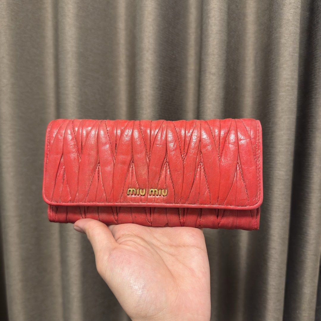 Miu Miu long wallet (Category: Wallets & Card holders) located in Quezon City. Submitted by hintstreet (Listing ID 1469323477, Image 3). Description: With dustbag and paper bag .