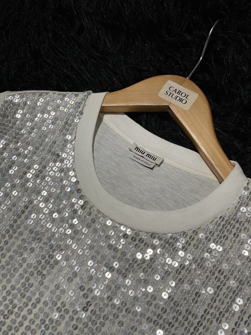 Miu Miu Shirt (Category: Activewear) located in Munoz. Submitted by bb_jimbo0 (Listing ID 1469280474, Image 2). Description: Miu miu shirt no issue Xs on tag.