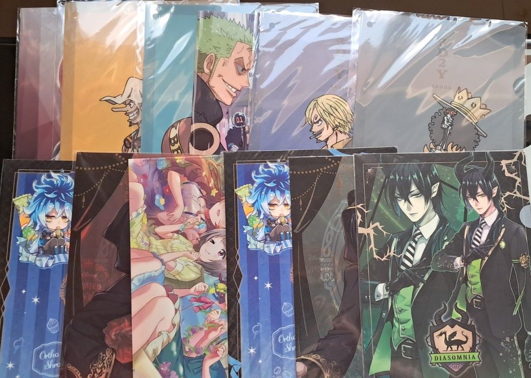 Mix Anime folder set (Category: Character Goods) located in Baguio. Submitted by mooncollectibles_000a43 (Listing ID 1469182945, Image 2). Description: - Authentic anime clear file folders featuring popular series: One Piece, Demon Slayer, and Twisted Wonderland - Features fan-favorite characters including Zoro, Sanji, Brook, Malleus, and Cater - Protective sleeves keep your documents clean, neat, and dust-free - Versatile use: ideal for organizi