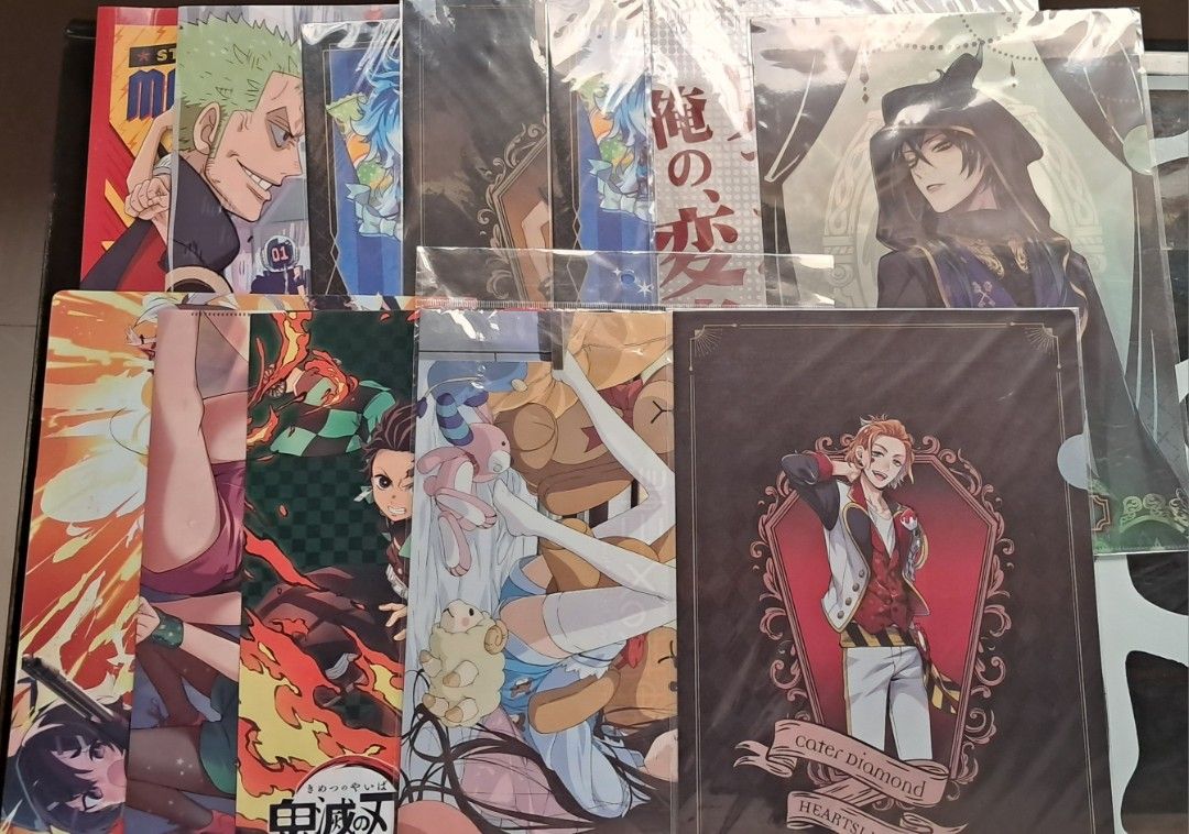Mix Anime folder set (Category: Character Goods) located in Baguio. Submitted by mooncollectibles_000a43 (Listing ID 1469182945, Image 1). Description: - Authentic anime clear file folders featuring popular series: One Piece, Demon Slayer, and Twisted Wonderland - Features fan-favorite characters including Zoro, Sanji, Brook, Malleus, and Cater - Protective sleeves keep your documents clean, neat, and dust-free - Versatile use: ideal for organizi