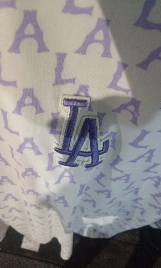 MLB aop LA (Category: Tshirts & Polo Shirts ) located in Pasig City. Submitted by thrifttofit (Listing ID 1469308065, Image 3). Description: MLB oap AL Size Large Excellent condition Color rate 10/10 L-28 w-24.5 No issue need lang laba. Pasig city.