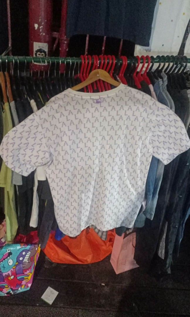 MLB aop LA (Category: Tshirts & Polo Shirts ) located in Pasig City. Submitted by thrifttofit (Listing ID 1469308065, Image 2). Description: MLB oap AL Size Large Excellent condition Color rate 10/10 L-28 w-24.5 No issue need lang laba. Pasig city.