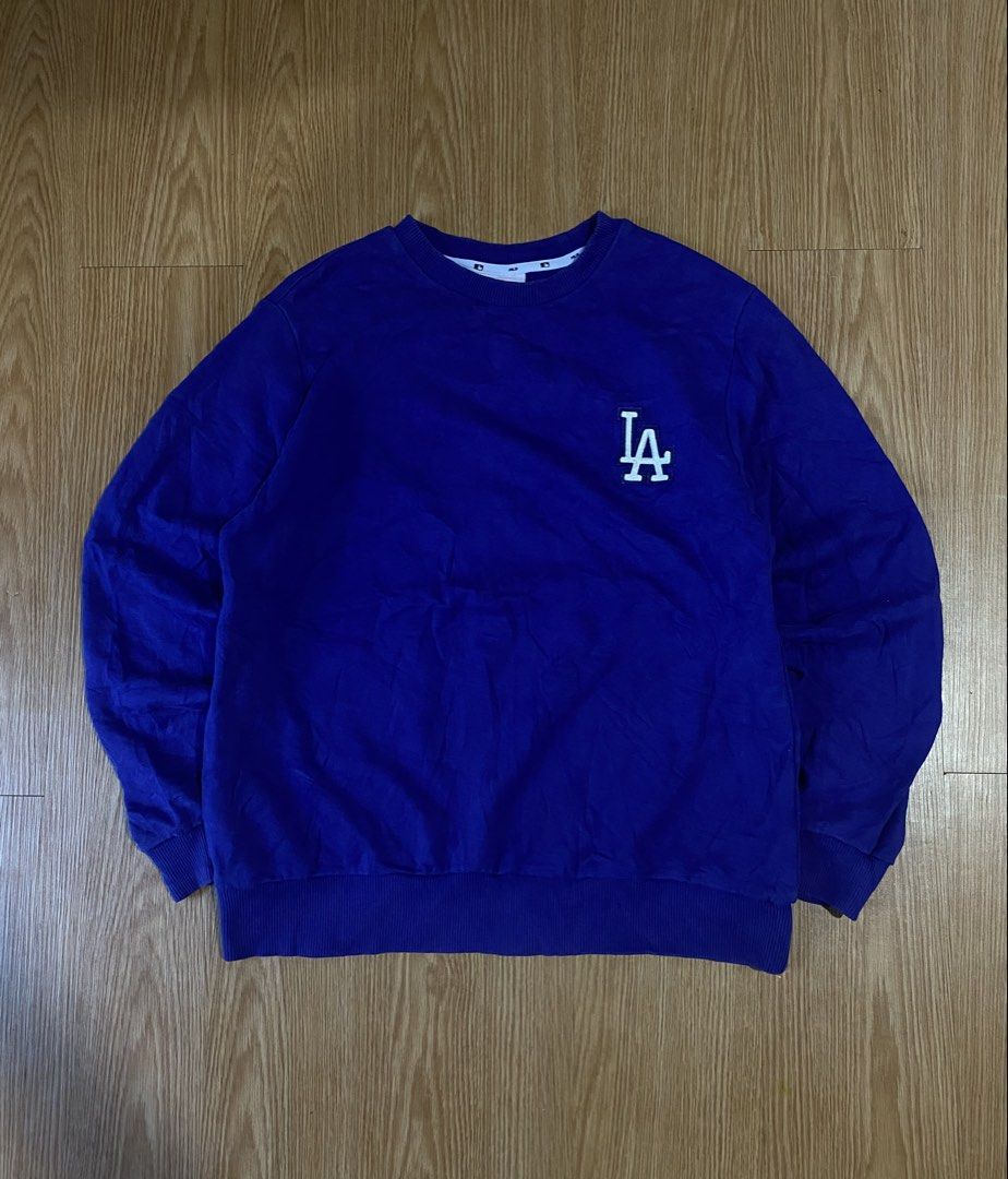 MLB LA Dodgers Crewneck Sweater (Category: Coats, Jackets and Outerwear) located in Lapu Lapu. Submitted by jess12-25-20005 (Listing ID 1469282871, Image 1). Description: Authentic Complete tags Small-Medium L25.5 W20.6 Condition: 9.5/10 Color rate: 9.5/10 No issue.