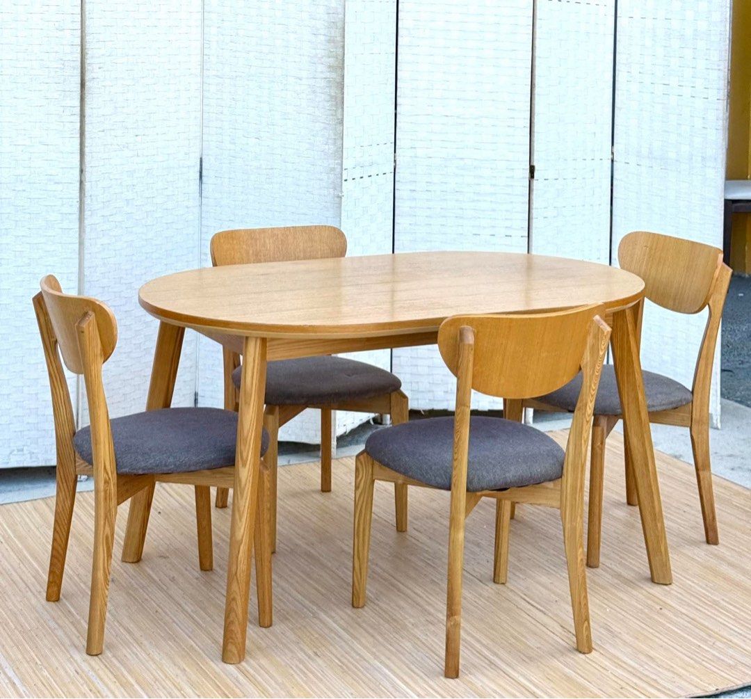 Modern Dining Set (Category: Tables & Sets) located in Manila. Submitted by elliefurnies31 (Listing ID 1469343789, Image 1). Description: JAPAN SURPLUS 4 SEATER MODERN DESIGN OVAL DINING SET IN GOOD CONDITION SIZE: 28.5H x 51L x 31.5W inches 16.5H x 17L x 17.5W inches.