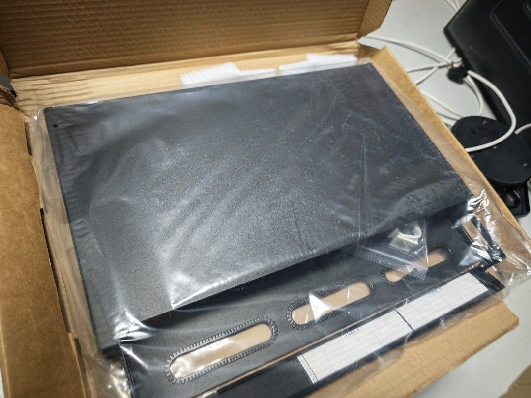 Modular Fibre Patch Panel (Category: Networking) located in Singapore. Submitted by ronglee2017 (Listing ID 1469302845, Image 1). Description: -Brand Datwyler Modular Black patch panel 19” Sliding type rack mount - Condition: Brand new, unopened, still sealed in plastic and original box - Included: Small hardware baggie - Features: Label area across bottom front panel - Cleanliness: Zero scuffs or dust, pristine condition - Ideal for: Ready for n
