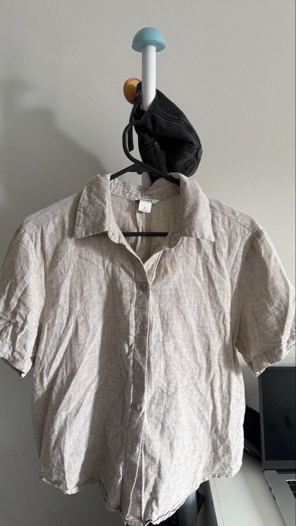 Monki Linen Short Sleeve Shirt (Category: Shirts) located in Makati City. Submitted by andrae.thomas (Listing ID 1469219116, Image 1). Description: - Brand: Monki - Size: S (Made in China) - Color: Neutral beige / earth tone - Fit: Regular fit with collar and front button closure Makati area. .