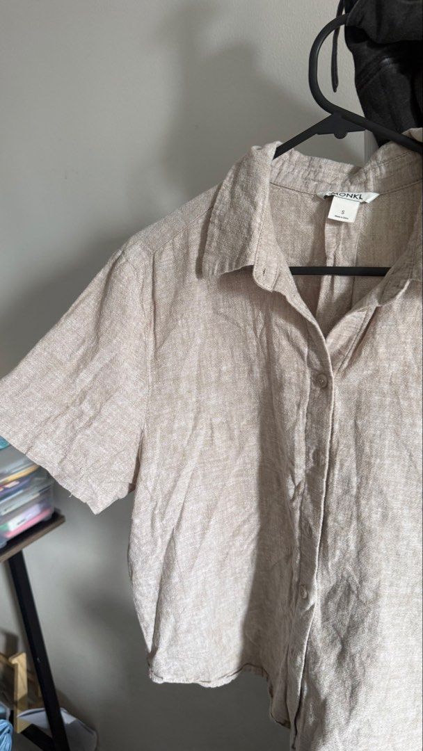 Monki Linen Short Sleeve Shirt (Category: Shirts) located in Makati City. Submitted by andrae.thomas (Listing ID 1469219116, Image 3). Description: - Brand: Monki - Size: S (Made in China) - Color: Neutral beige / earth tone - Fit: Regular fit with collar and front button closure Makati area. .