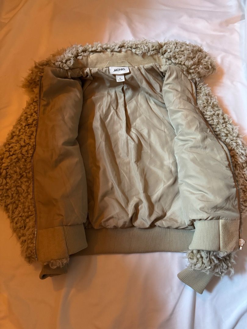 Monki Teddy Fur Jacket Beige XS (Category: Coats, Jackets and Outerwear) located in Cebu City. Submitted by txproj27 (Listing ID 1469216840, Image 2). Description: - Brand: Monki - Style: Fuzzy teddy jacket - Color: Beige - Size: XS - Fit: Cropped - Features: High collar, ribbed cuffs and hem, fully lined interior - Material: Super soft and warm - Condition: Great layering piece.