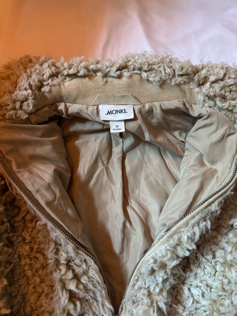 Monki Teddy Fur Jacket Beige XS (Category: Coats, Jackets and Outerwear) located in Cebu City. Submitted by txproj27 (Listing ID 1469216840, Image 3). Description: - Brand: Monki - Style: Fuzzy teddy jacket - Color: Beige - Size: XS - Fit: Cropped - Features: High collar, ribbed cuffs and hem, fully lined interior - Material: Super soft and warm - Condition: Great layering piece.