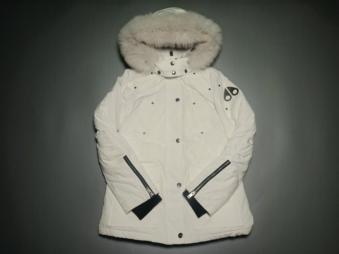 Moose Knuckles White Down Parka Jacket with Fur Hood (Category: Coats, Jackets and Outerwear) located in Baguio. Submitted by olandotdream (Listing ID 1469170174, Image 2). Description: - Authentic Moose Knuckles winter parka in clean white - Genuine fur trim on the hood for added warmth and style - Heavy down filling designed for freezing weather - Iconic metal logo on the sleeve - Multiple front pockets for convenience - Secure zip closure with