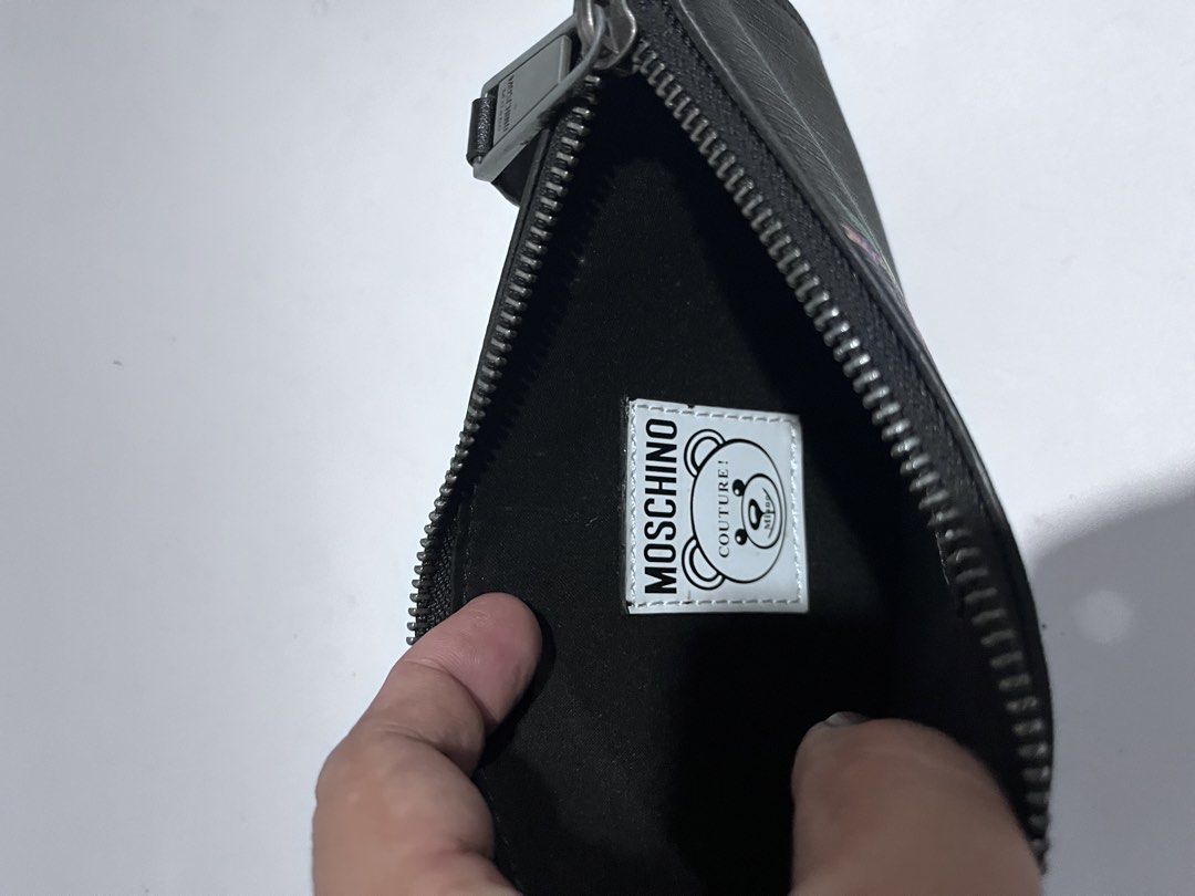 Moschino (Category: Clutches) located in Dagupan City. Submitted by calmocean-f675cc (Listing ID 1469279061, Image 3). Description: Moschino Pouch Authentic 1200 add sf.