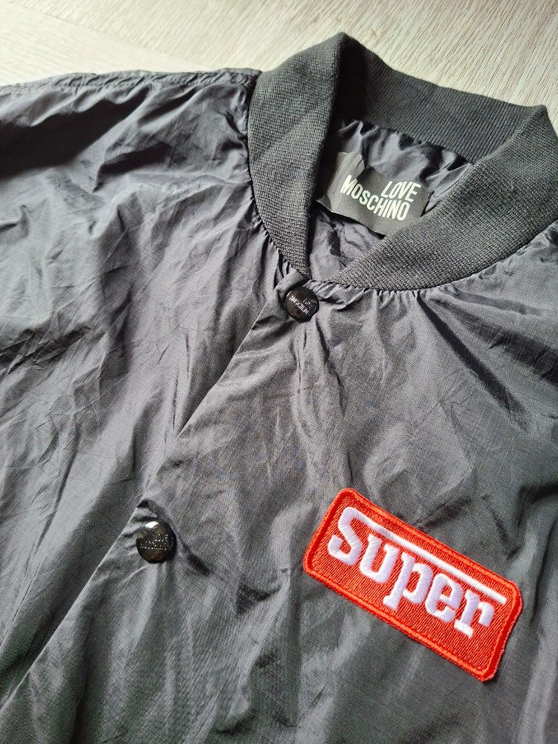 Moschino racing bomber jacket (Category: Coats, Jackets and Outerwear) located in Panabo. Submitted by creticalfinds (Listing ID 1469331521, Image 2). Description: Moschino racing bomber jacket.