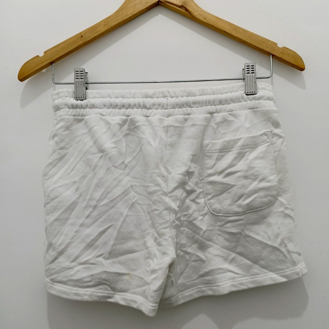 MSGM White Pink Logo Sweat Shorts (Category: Shorts) located in Santa Rita. Submitted by papagabs01 (Listing ID 1469165864, Image 2). Description: - Waist 26-30 - Length 11.5 - need wash lang😊 - Brand: MSGM Kids - Color: White with bright pink embroidered logo - Material: Soft, comfortable cotton - Features: Elastic waistband with black drawstring, back patch pocket - Perfect casual wear for kids.