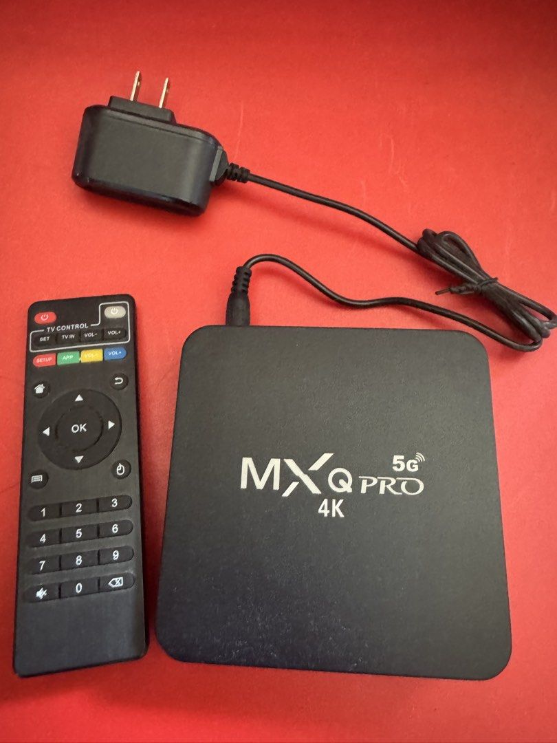 MXQ PRO 4K 5G Android TV Box with Remote and Power Adapter (Category: TV Parts & Accessories) located in Manila. Submitted by xenasales (Listing ID 1469174971, Image 1). Description: - Model: MXQ Pro 4K 5G TV Box - Color: Black - Function: Turns regular TVs into smart entertainment hubs - Inclusions: Main streaming box unit, standard remote control, and power adapter plug - Condition: Everything pictured is included - Mode of Payment: GCash, bank