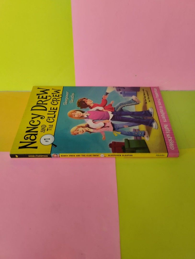 Nancy Drew and the Clue Crew: Sleepover Sleuths #1 (Category: Storybooks) located in Quezon City. Submitted by gaiarisaheart (Listing ID 1469189847, Image 3). Description: - Title: Sleepover Sleuths (Nancy Drew and the Clue Crew, Book 1) - Author: Carolyn Keene - Illustrator: Macky Pamintuan - Publisher: Aladdin Paperbacks - Format: Paperback - Recommended Age: 6 to 9 years old - Plot: 10 fun chapters following the mystery of Deirdre's missing Ho