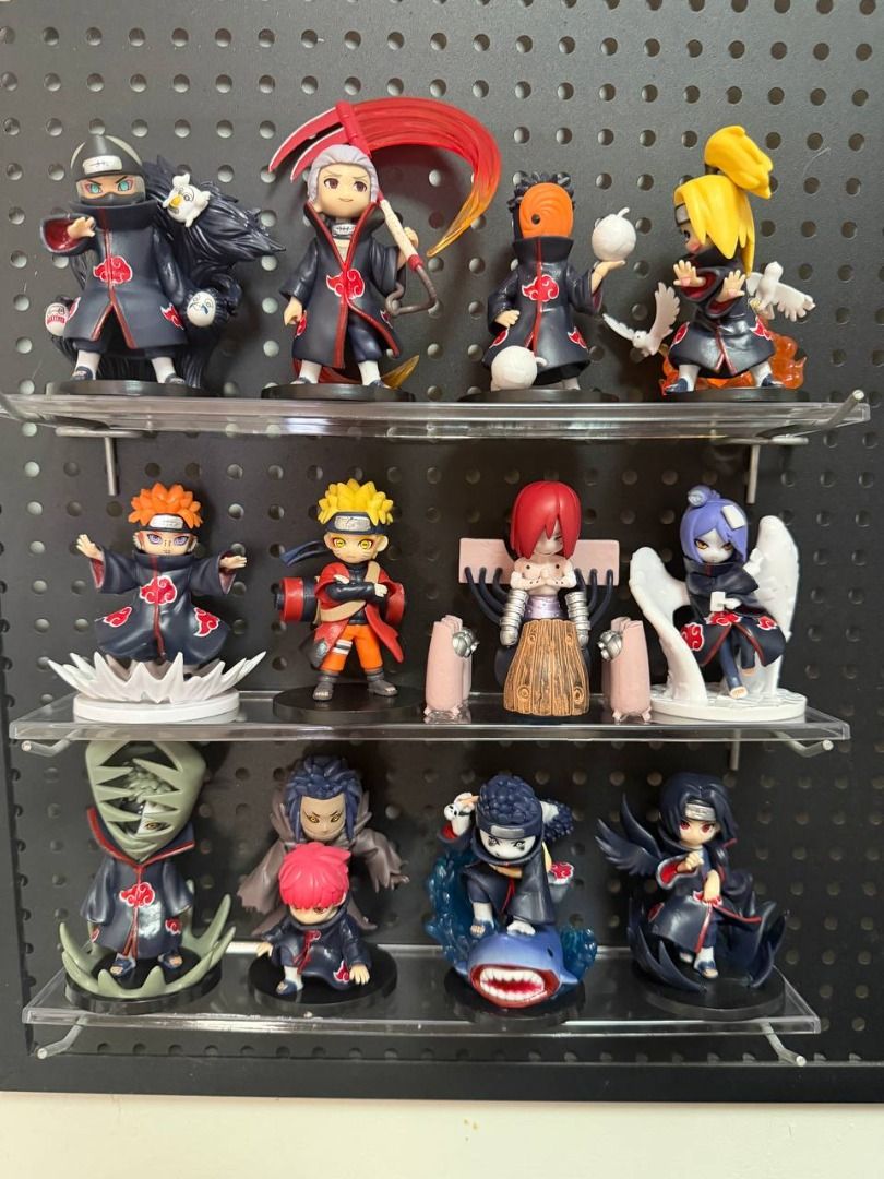 Naruto figure -12 pcs (Category: Figurines & Statues) located in Caloocan City. Submitted by silentdragon_931b8a (Listing ID 1469223588, Image 1). Description: - Character: Kakuzu from Naruto (Akatsuki) - Design: Wearing iconic red cloud cloak with floating facial masks behind him - Pose: Dynamic stance with one hand reaching forward - Base: Sturdy black circular base included - Condition: Great, clean paintwork with no scuffs - Ideal for: Anime 
