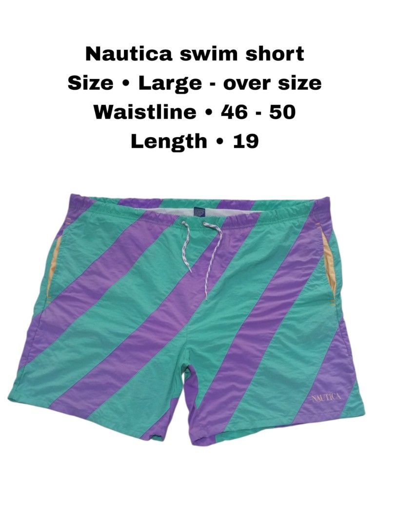Nautica Swim Short Size Large Over Size (Category: Swim Trunks & Board Shorts) located in Magdalena. Submitted by magdalenathrift20 (Listing ID 1469168357, Image 1). Description: - Brand: Nautica - Design: Purple and turquoise striped pattern - Size: L (Oversized fit) - Waistline: Stretches from 46 to 50 inches - Length: 19 inches - Material: 100% nylon shell with 100% polyester mesh lining - Features: Side pockets, adjustable drawstring waistban