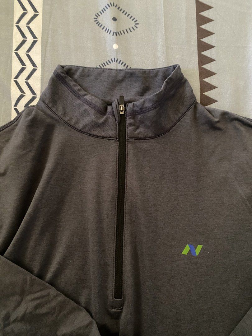 Nayta muotia Quarter-Zip Pullover Size S (Category: Coats, Jackets and Outerwear) located in Taguig. Submitted by maaarrrrrcky (Listing ID 1469199019, Image 1). Description: - Brand/Style: Nayta Muotia quarter-zip athletic top -Rash Guard - Color: Dark grey - Size: Small (with clean interior tag) - Material: 88% recycled polyester, 12% lycra for comfortable stretch - Features: Long sleeves, high neck with zip closure, and small logo on the chest 