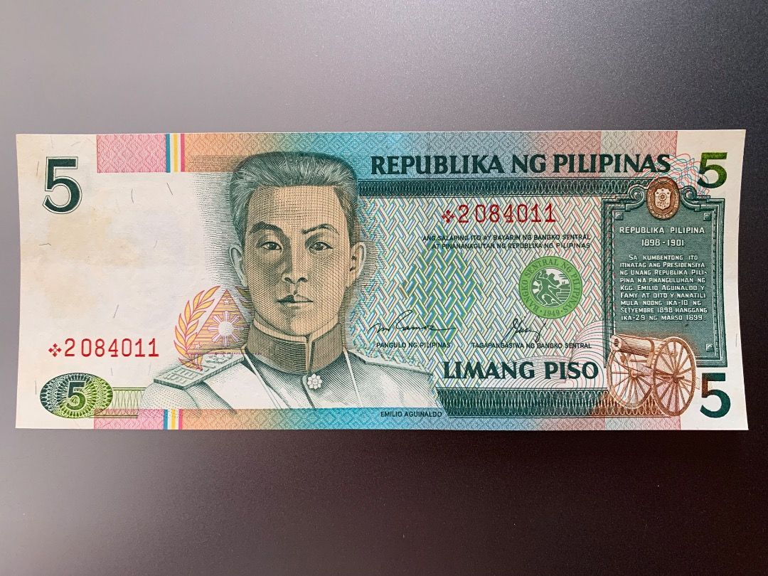 NDS - 5 pesos star note (Ramos-Cuisia) 1 (Category: Currency) located in Indang. Submitted by vykolektor (Listing ID 1469202197, Image 1). Description: NDS banknote 5 pesos Replacement/Star note Ramos-Cuisia Condition in photos.