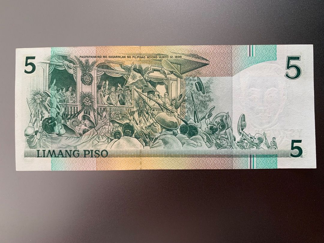 NDS - 5 pesos star note (Ramos-Cuisia) 1 (Category: Currency) located in Indang. Submitted by vykolektor (Listing ID 1469202197, Image 2). Description: NDS banknote 5 pesos Replacement/Star note Ramos-Cuisia Condition in photos.