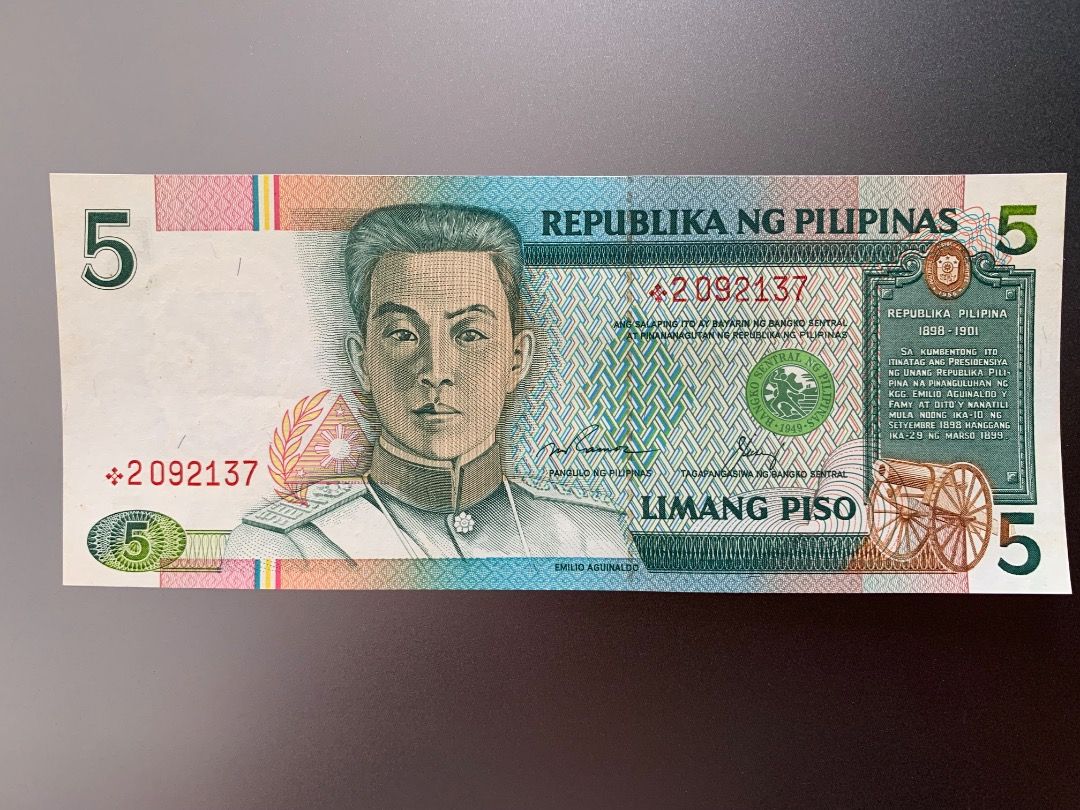 NDS - 5 pesos star note (Ramos-Cuisia) 2 (Category: Currency) located in Indang. Submitted by vykolektor (Listing ID 1469203337, Image 1). Description: NDS banknote 5 peso Replacement/star note Ramos-Cuisia Condition in photos.