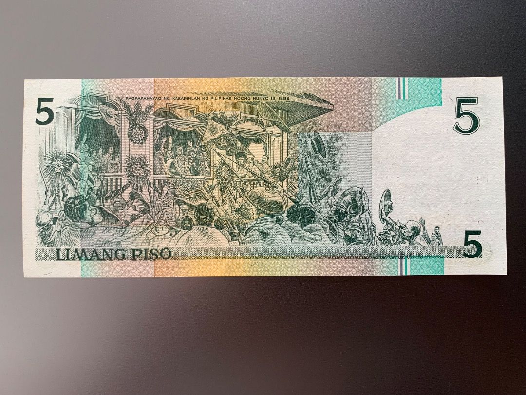 NDS - 5 pesos star note (Ramos-Cuisia) 2 (Category: Currency) located in Indang. Submitted by vykolektor (Listing ID 1469203337, Image 2). Description: NDS banknote 5 peso Replacement/star note Ramos-Cuisia Condition in photos.