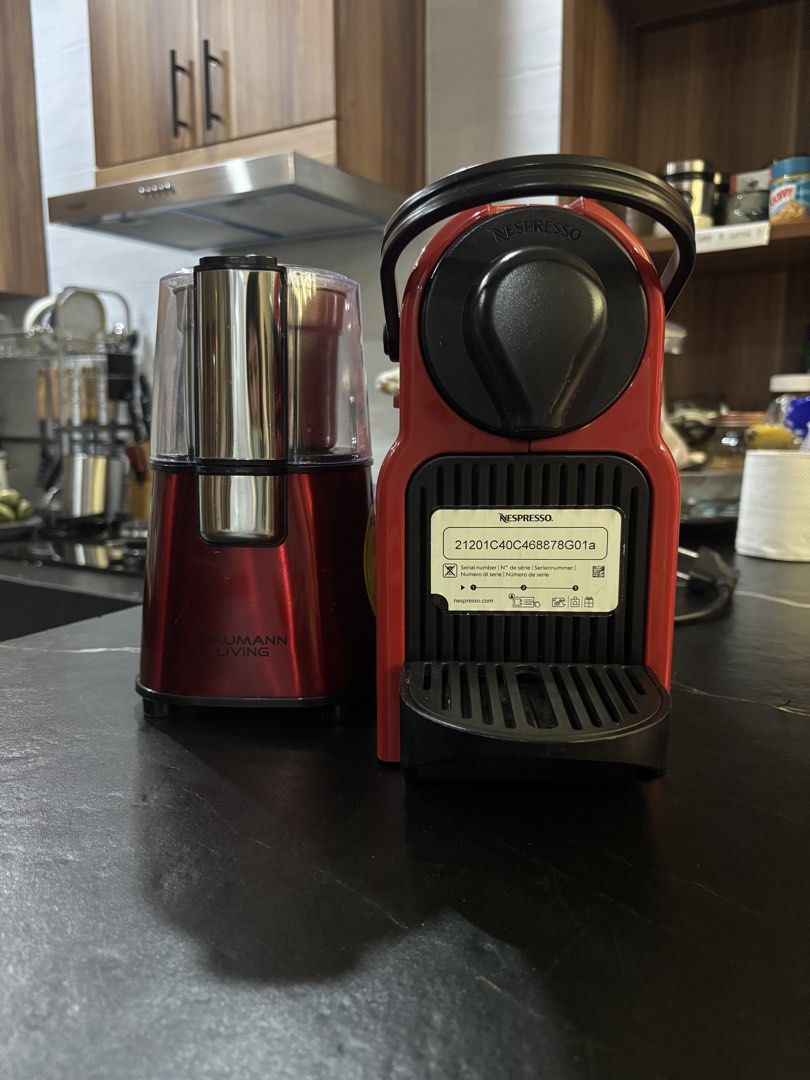 Nespresso Red Coffee Maker and Baumann Living Grinder (Category: Coffee Machines & Makers) located in Manila. Submitted by leana678910 (Listing ID 1469274485, Image 1). Description: - Red Nespresso capsule coffee machine matching Baumann Living grinder - Barely Used, Good condition - Clean water tank and drip tray - Standard power plugs - Perfect, ready-to-use setup for daily home espresso QC/ Manila Pickup.
